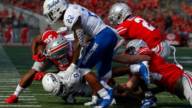 Ohio State Buckeyes running back TreVeyon Henderson (32) runs the ball during the second quarter of a NCAA Division I football game between the Ohio State Buckeyes and the Tulsa Golden Hurricane on Saturday, Sept. 18, 2021 at Ohio Stadium in Columbus, Ohio.

Cfb Tulsa Golden Hurricane At Ohio State Buckeyes