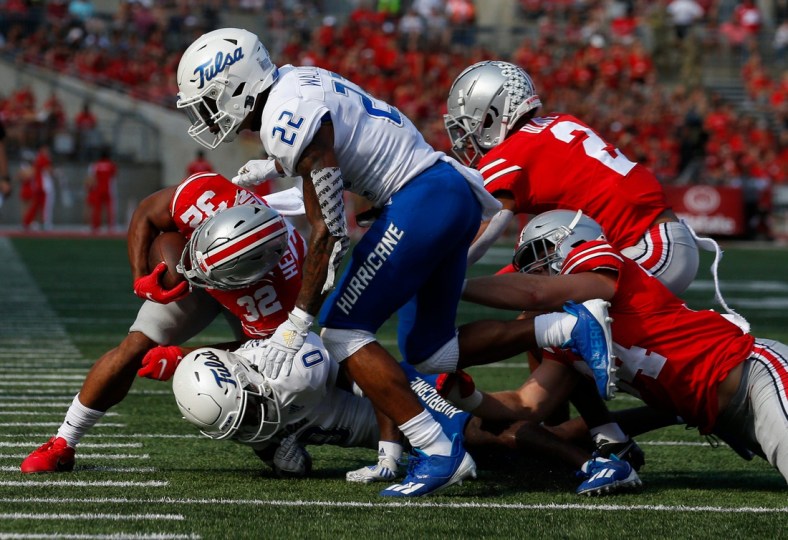 Ohio State Buckeyes running back TreVeyon Henderson (32) runs the ball during the second quarter of a NCAA Division I football game between the Ohio State Buckeyes and the Tulsa Golden Hurricane on Saturday, Sept. 18, 2021 at Ohio Stadium in Columbus, Ohio.

Cfb Tulsa Golden Hurricane At Ohio State Buckeyes