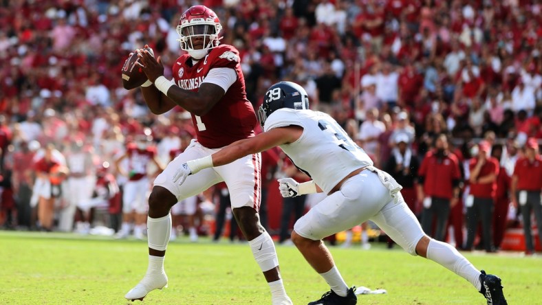 Sep 18, 2021; Fayetteville, Arkansas, USA; Arkansas Razorbacks quarterback KJ Jefferson (1) passes in the second quarter as Georgia Southern Eagles linebacker Reid Dedman (39) defends at Donald W. Reynolds Razorback Stadium. Mandatory Credit: Nelson Chenault-USA TODAY Sports