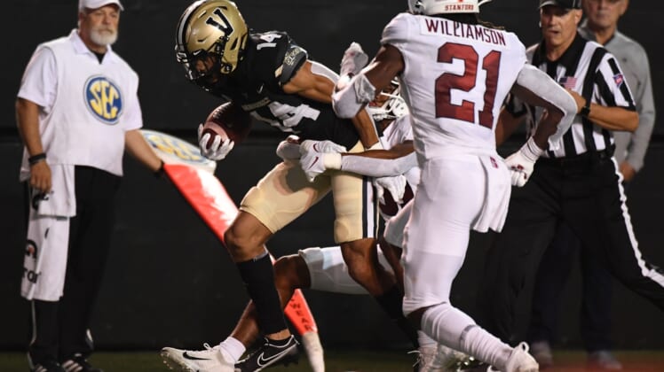 Sep 18, 2021; Nashville, Tennessee, USA; Vanderbilt Commodores wide receiver Will Sheppard (14) runs for a first down after a reception during the first half against the Stanford Cardinal at Vanderbilt Stadium. Mandatory Credit: Christopher Hanewinckel-USA TODAY Sports