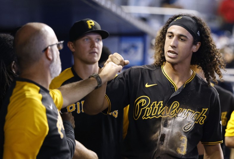 Sep 19, 2021; Miami, Florida, USA;  Pittsburgh Pirates right fielder Cole Tucker (3) is congratulated by teammates after scoring against the Miami Marlins during the second inning at loanDepot Park. Mandatory Credit: Rhona Wise-USA TODAY Sports