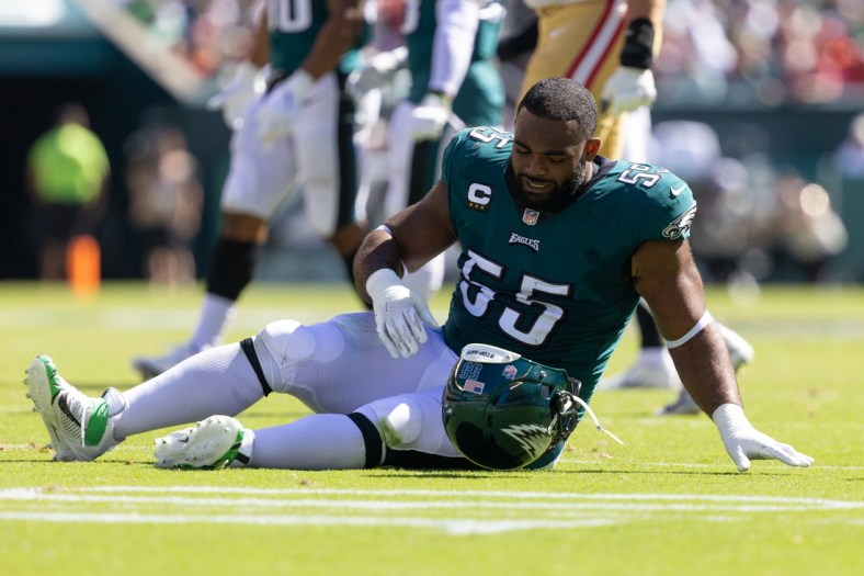 Sep 19, 2021; Philadelphia, Pennsylvania, USA; Philadelphia Eagles defensive end Brandon Graham (55) takes off his helmet after being injured during the second quarter against the San Francisco 49ers at Lincoln Financial Field. Mandatory Credit: Bill Streicher-USA TODAY Sports