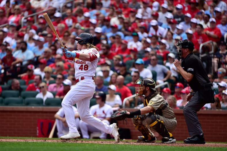 Sep 19, 2021; St. Louis, Missouri, USA;  St. Louis Cardinals center fielder Harrison Bader (48) hits a two run double during the first inning against the San Diego Padres at Busch Stadium. Mandatory Credit: Jeff Curry-USA TODAY Sports