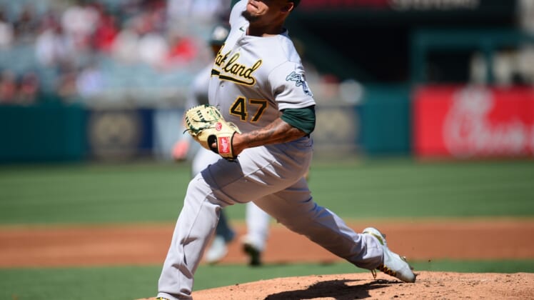 Sep 19, 2021; Anaheim, California, USA; Oakland Athletics starting pitcher Frankie Montas (47) throws against the Los Angeles Angels during the second inning at Angel Stadium. Mandatory Credit: Gary A. Vasquez-USA TODAY Sports