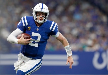 Indianapolis Colts quarterback Carson Wentz (2) runs the ball up the field during the second half of an Indianapolis Colts game against the Los Angeles Rams on Sunday, Sept. 19, 2021, at Lucas Oil Stadium. The Rams won 27-24.