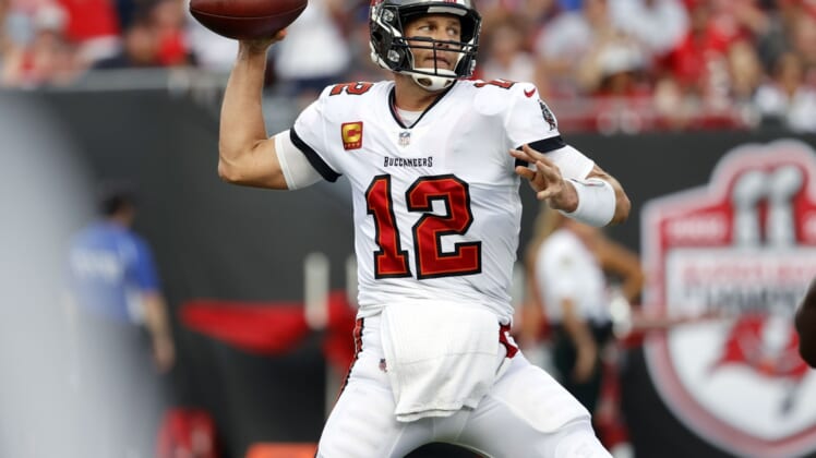 Sep 19, 2021; Tampa, Florida, USA;Tampa Bay Buccaneers quarterback Tom Brady (12) throws the ball against the Atlanta Falcons  during the first half at Raymond James Stadium. Mandatory Credit: Kim Klement-USA TODAY Sports