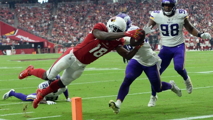 Sep 19, 2021; Glendale, Arizona, USA; Arizona Cardinals wide receiver A.J. Green (18) dives for a touchdown against the Minnesota Vikings during the second half at State Farm Stadium. Mandatory Credit: Joe Camporeale-USA TODAY Sports
