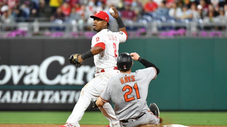 Sep 20, 2021; Philadelphia, Pennsylvania, USA; Philadelphia Phillies shortstop Jean Segura (2) turns a double play against Baltimore Orioles right fielder Austin Hays (21) during the second inning at Citizens Bank Park. Mandatory Credit: Eric Hartline-USA TODAY Sports