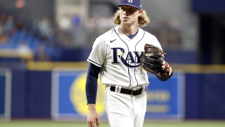 Sep 20, 2021; St. Petersburg, Florida, USA;   Tampa Bay Rays pitcher Shane Baz (11) looks on at the end of the second inning against the Toronto Blue Jays at Tropicana Field. Mandatory Credit: Kim Klement-USA TODAY Sports