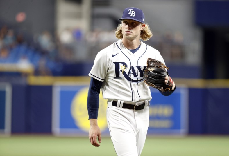 Sep 20, 2021; St. Petersburg, Florida, USA;   Tampa Bay Rays pitcher Shane Baz (11) looks on at the end of the second inning against the Toronto Blue Jays at Tropicana Field. Mandatory Credit: Kim Klement-USA TODAY Sports