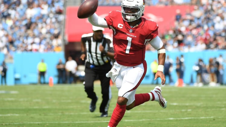 Sep 12, 2021; Nashville, Tennessee, USA; Arizona Cardinals quarterback Kyler Murray (1) runs for a touchdown against the Tennessee Titans at Nissan Stadium. Mandatory Credit: Christopher Hanewinckel-USA TODAY Sports