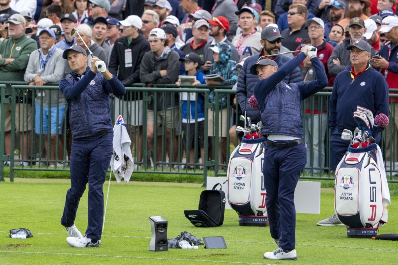 September 21, 2021; Kolher, Wisconsin, USA; U.S. Team players Jordan Spieth (left) and Justin Thomas (right) hit on the driving range during a practice round for the 43rd Ryder Cup golf competition at Whistling Straits. Mandatory Credit: Kyle Terada-USA TODAY Sports