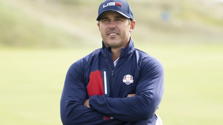 September 22, 2021; Haven, Wisconsin, USA; Team USA player Brooks Koepka poses for a photo during a practice round for the 43rd Ryder Cup golf competition at Whistling Straits. Mandatory Credit: Kyle Terada-USA TODAY Sports