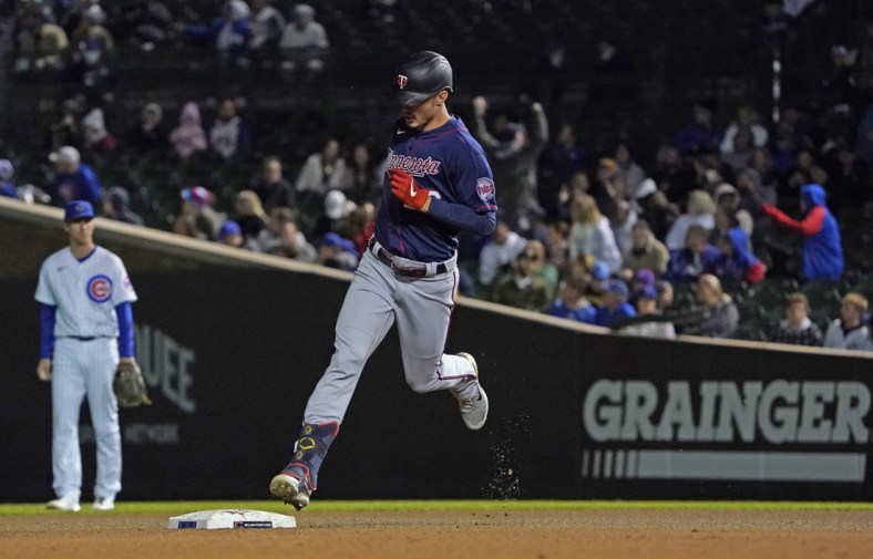 Sep 22, 2021; Chicago, Illinois, USA; Minnesota Twins left fielder Max Kepler (26) runs the bases after hitting a home run against the Chicago Cubs during the fourth inning at Wrigley Field. Mandatory Credit: David Banks-USA TODAY Sports