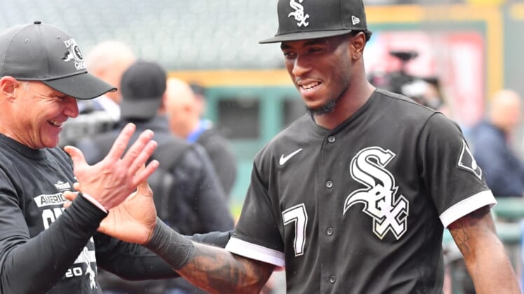 Sep 23, 2021; Cleveland, Ohio, USA; Chicago White Sox shortstop Tim Anderson (7) and third base coach Joe McEwing (47) celebrate after the White Sox beat the Cleveland Indians and clinched the American League Central Division at Progressive Field. Mandatory Credit: Ken Blaze-USA TODAY Sports