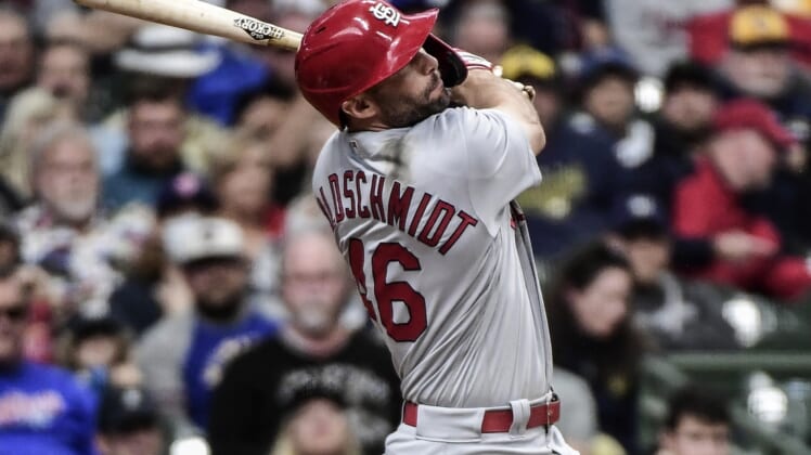 Sep 23, 2021; Milwaukee, Wisconsin, USA; St. Louis Cardinals first baseman Paul Goldschmidt (46) hits a solo home run in the ninth inning against the Milwaukee Brewers at American Family Field. Mandatory Credit: Benny Sieu-USA TODAY Sports