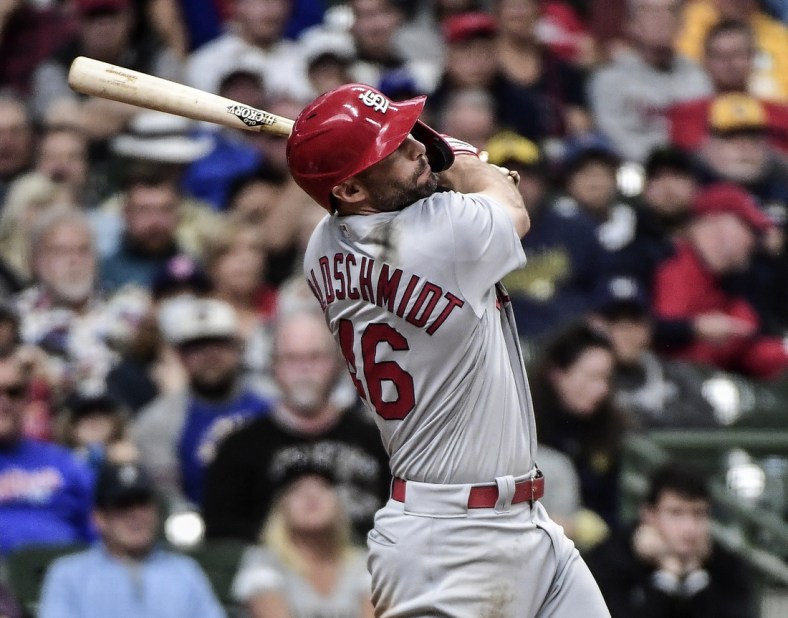 Sep 23, 2021; Milwaukee, Wisconsin, USA; St. Louis Cardinals first baseman Paul Goldschmidt (46) hits a solo home run in the ninth inning against the Milwaukee Brewers at American Family Field. Mandatory Credit: Benny Sieu-USA TODAY Sports