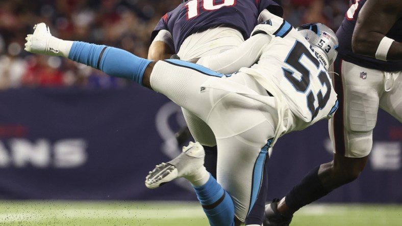 Sep 23, 2021; Houston, Texas, USA; Carolina Panthers defensive end Brian Burns (53) sacks Houston Texans quarterback Davis Mills (10) during the second quarter at NRG Stadium. Mandatory Credit: Troy Taormina-USA TODAY Sports