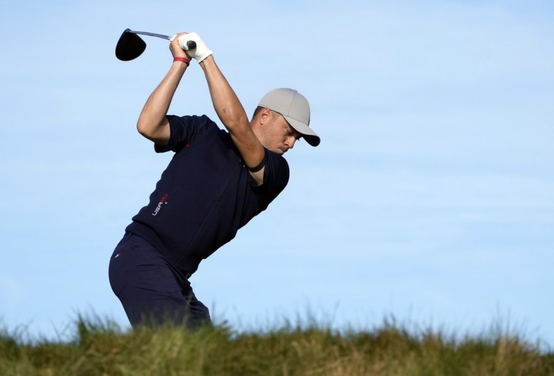 Sep 24, 2021; Haven, Wisconsin, USA; Team USA player Justin Thomas plays his shot from the ninth tee during day one foursome rounds for the 43rd Ryder Cup golf competition at Whistling Straits. Mandatory Credit: Michael Madrid-USA TODAY Sports