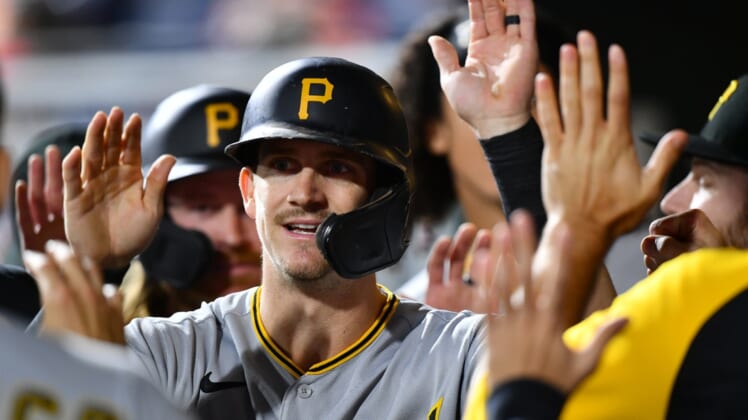 Sep 24, 2021; Philadelphia, Pennsylvania, USA; Pittsburgh Pirates infielder Kevin Newman (27) celebrates with teammates after scoring in the fourth inning against the Philadelphia Phillies at Citizens Bank Park. Mandatory Credit: Kyle Ross-USA TODAY Sports