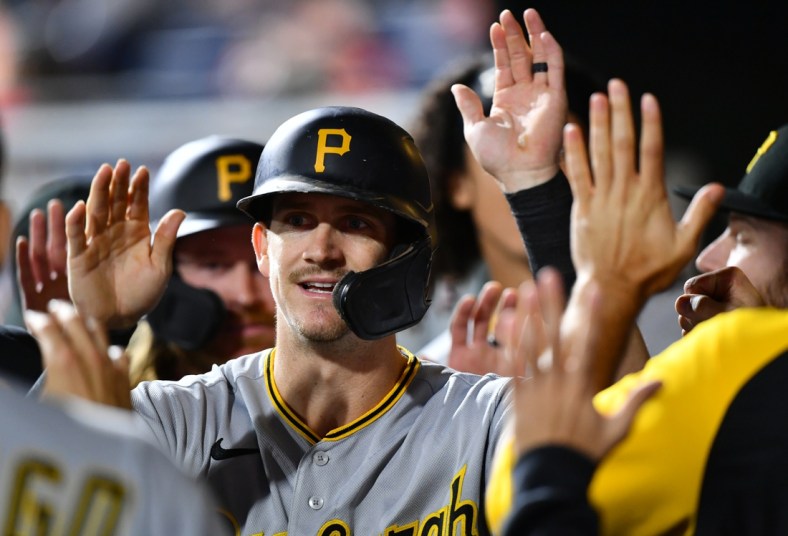 Sep 24, 2021; Philadelphia, Pennsylvania, USA; Pittsburgh Pirates infielder Kevin Newman (27) celebrates with teammates after scoring in the fourth inning against the Philadelphia Phillies at Citizens Bank Park. Mandatory Credit: Kyle Ross-USA TODAY Sports