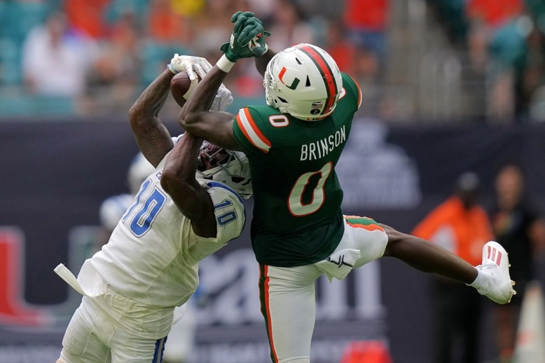 Sep 25, 2021; Miami Gardens, Florida, USA; Central Connecticut State Blue Devils cornerback Dexter Lawson Jr. (10) breaks up a pass intended for Miami Hurricanes wide receiver Romello Brinson (0) during the first half at Hard Rock Stadium. Mandatory Credit: Jasen Vinlove-USA TODAY Sports