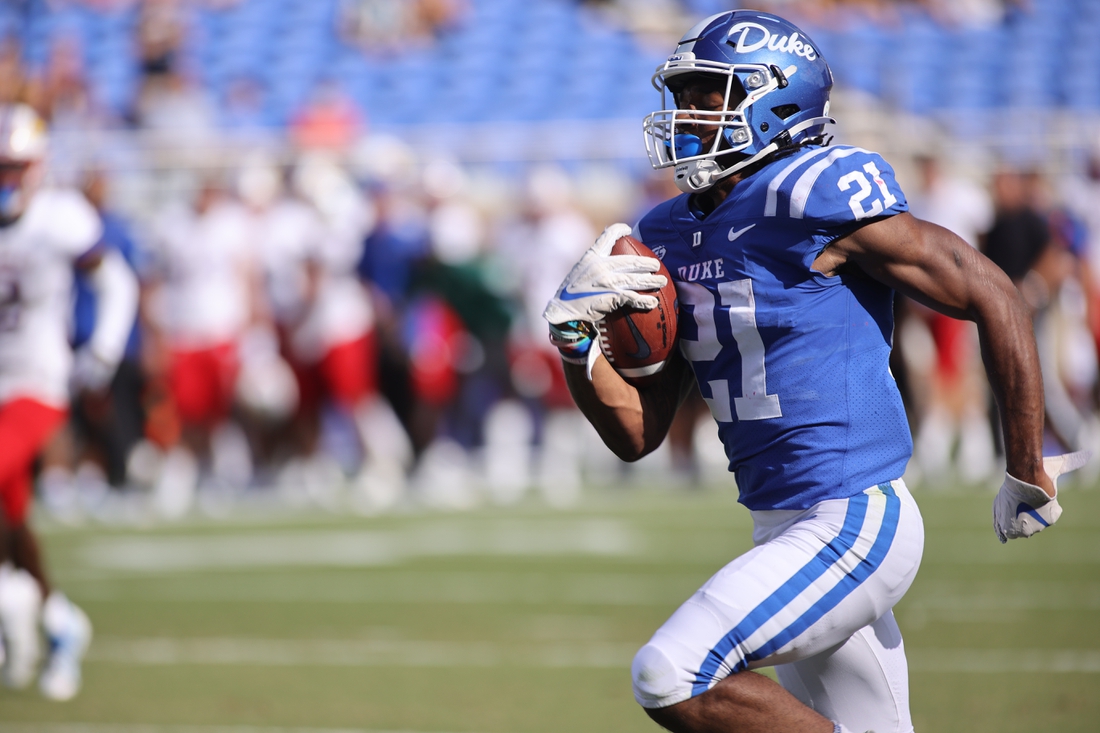 Sep 25, 2021; Durham, North Carolina, USA;  Duke Blue Devils running back Mataeo Durant (21) run with the football to make a touchdown during the 1st half of the game against the Kansas Jayhawks at Wallace Wade Stadium. Mandatory Credit: Jaylynn Nash-USA TODAY Sports