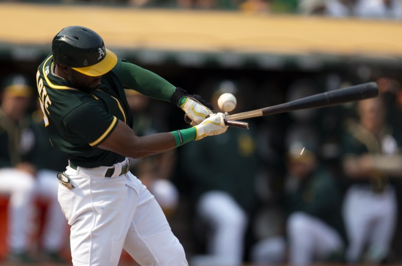 Sep 25, 2021; Oakland, California, USA; Oakland Athletics center fielder Starling Marte (2) breaks his bat fouling off a pitch from Houston Astros pitcher Kendall Graveman during the seventh inning at RingCentral Coliseum. Mandatory Credit: D. Ross Cameron-USA TODAY Sports