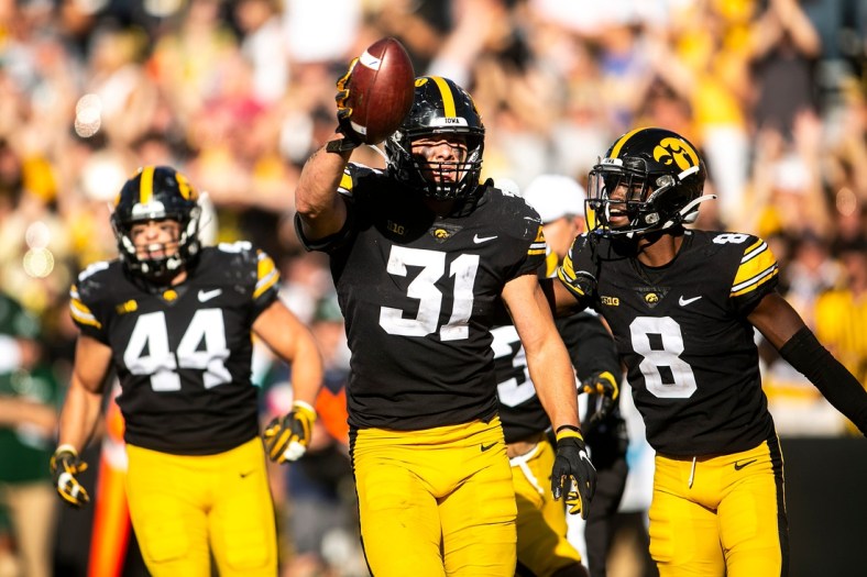 Iowa linebacker Jack Campbell (31) celebrates with teammates after getting a stop during a NCAA non-conference football game against Colorado State, Saturday, Sept. 25, 2021, at Kinnick Stadium in Iowa City, Iowa.

210925 Colo St Iowa Fb 030 Jpg