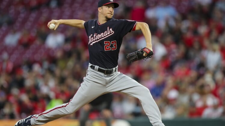 Sep 25, 2021; Cincinnati, Ohio, USA; Washington Nationals starting pitcher Erick Fedde (23) throws a pitch against the Cincinnati Reds in the first inning at Great American Ball Park. Mandatory Credit: Katie Stratman-USA TODAY Sports