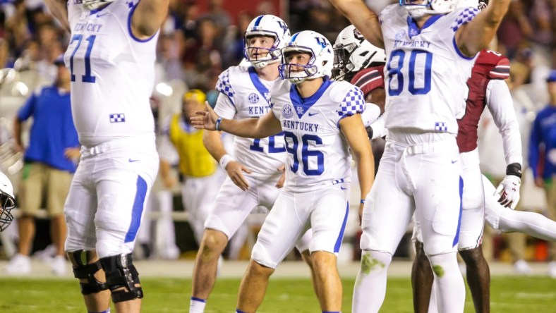 Sep 25, 2021; Columbia, South Carolina, USA; Kentucky Wildcats offensive tackle John Young (71) and tight end Brenden Bates (80) react after a successful field goal attempt by place kicker Matt Ruffolo (96) against the South Carolina Gamecocks in the second quarter at Williams-Brice Stadium. Mandatory Credit: Jeff Blake-USA TODAY Sports