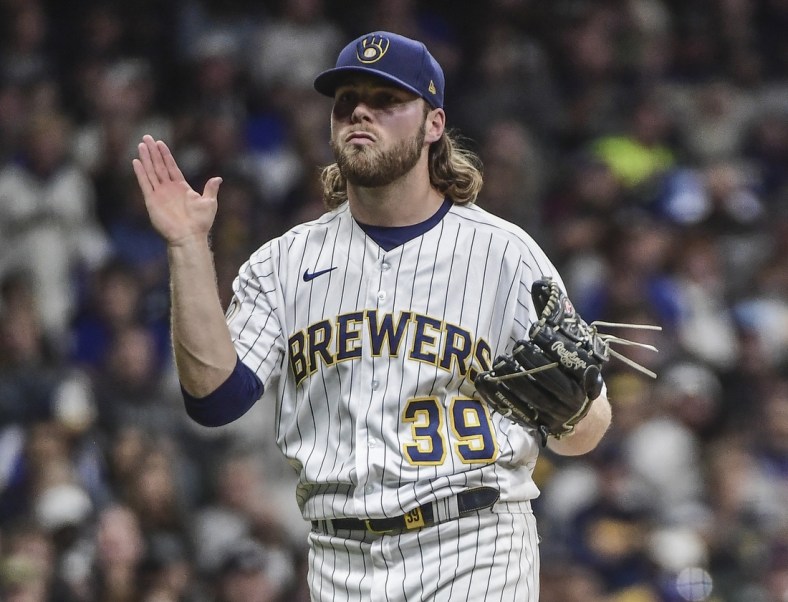 Sep 25, 2021; Milwaukee, Wisconsin, USA; Milwaukee Brewers pitcher Corbin Burnes (39) reacts after striking out New York Mets shortstop Francisco Lindor (not pictured) to end the fifth inning at American Family Field. Mandatory Credit: Benny Sieu-USA TODAY Sports