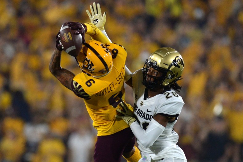 Sep 25, 2021; Tempe, Arizona, USA; Colorado Buffaloes cornerback Tyrin Taylor (28) breaks up a pass intended for Arizona State Sun Devils wide receiver LV Bunkley-Shelton (6) during the first half at Sun Devil Stadium. Mandatory Credit: Joe Camporeale-USA TODAY Sports