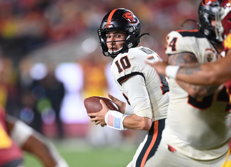 Sep 25, 2021; Los Angeles, California, USA; Oregon State Beavers quarterback Chance Nolan (10) looks to pass the ball in the first half of the game against the Oregon State Beavers at United Airlines Field at Los Angeles Memorial Coliseum. Mandatory Credit: Jayne Kamin-Oncea-USA TODAY Sports