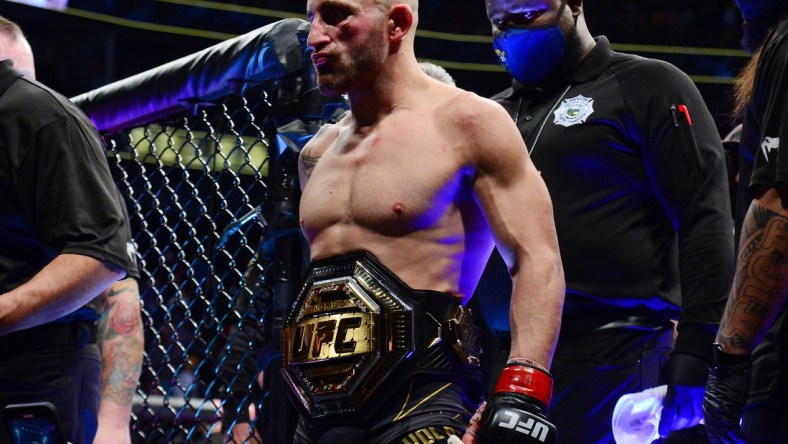 Sep 25, 2021; Las Vegas, Nevada, USA; Alexander Volkanovski reacts following his victory and title defense against Brian Ortega during UFC 266 at T-Mobile Arena. Mandatory Credit: Gary A. Vasquez-USA TODAY Sports