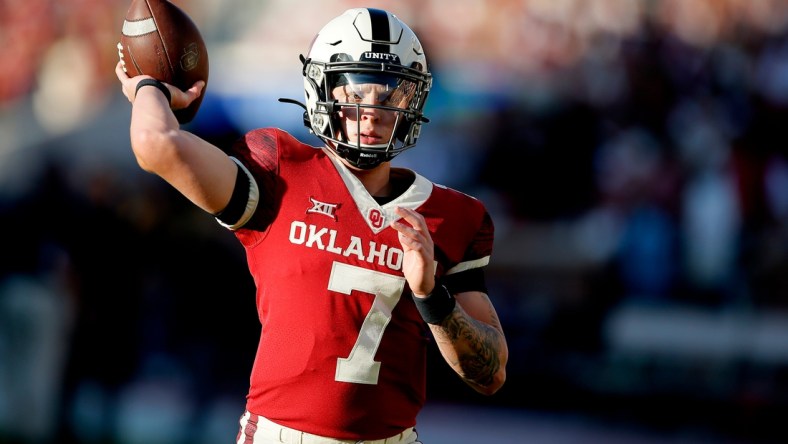 Oklahoma's Spencer Rattler (7) warms up before a college football game between the University of Oklahoma Sooners (OU) and the West Virginia Mountaineers at Gaylord Family-Oklahoma Memorial Stadium in Norman, Okla., Saturday, Sept. 25, 2021. Oklahoma won 16-13.

Lx10117