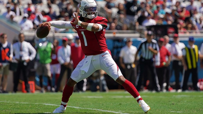 Sep 26, 2021; Jacksonville, Florida, USA; Arizona Cardinals quarterback Kyler Murray (1) attempts a pass against the Jacksonville Jaguars during the first half at TIAA Bank Field. Mandatory Credit: Jasen Vinlove-USA TODAY Sports