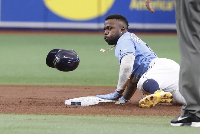 Sep 26, 2021; St. Petersburg, Florida, USA; Tampa Bay Rays left fielder Randy Arozarena (56) steals second base during the first inning against the Miami Marlins at Tropicana Field. Mandatory Credit: Kim Klement-USA TODAY Sports