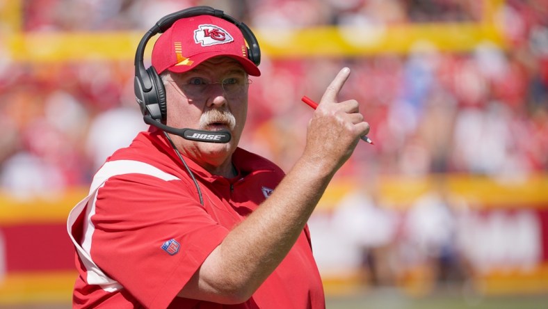 Sep 26, 2021; Kansas City, Missouri, USA; Kansas City Chiefs head coach Andy Reid motions to an official against the Los Angeles Chargers during the first half at GEHA Field at Arrowhead Stadium. Mandatory Credit: Denny Medley-USA TODAY Sports