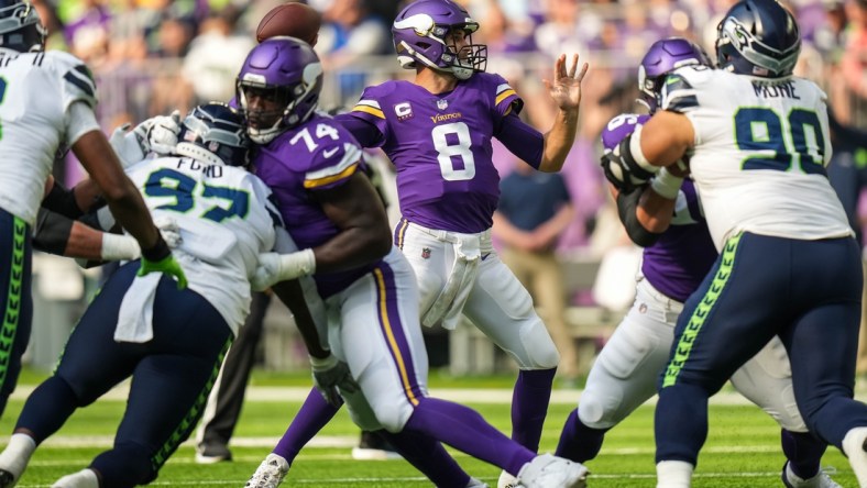 Sep 26, 2021; Minneapolis, Minnesota, USA; Minnesota Vikings quarterback Kirk Cousins (8) throws the ball during the first quarter against Seattle Seahawks at U.S. Bank Stadium. Mandatory Credit: Brace Hemmelgarn-USA TODAY Sports