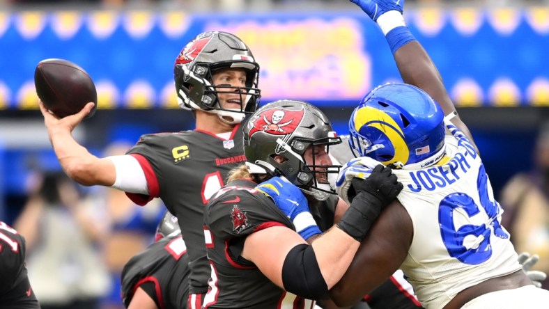 Sep 26, 2021; Inglewood, California, USA;  Los Angeles Rams defensive tackle Sebastian Joseph-Day (69) pressures Tampa Bay Buccaneers quarterback Tom Brady (12) as he looks to throw a pass in the first half of the game at SoFi Stadium. Mandatory Credit: Jayne Kamin-Oncea-USA TODAY Sports