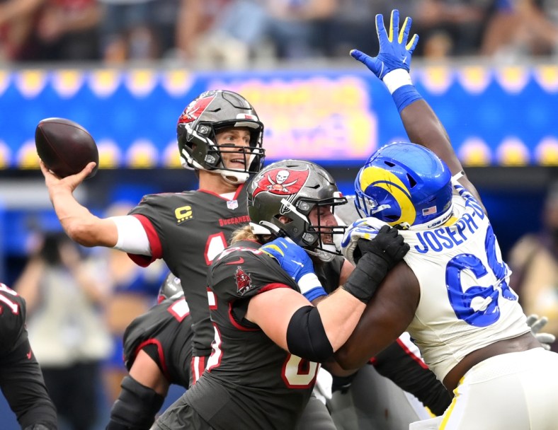 Sep 26, 2021; Inglewood, California, USA;  Los Angeles Rams defensive tackle Sebastian Joseph-Day (69) pressures Tampa Bay Buccaneers quarterback Tom Brady (12) as he looks to throw a pass in the first half of the game at SoFi Stadium. Mandatory Credit: Jayne Kamin-Oncea-USA TODAY Sports