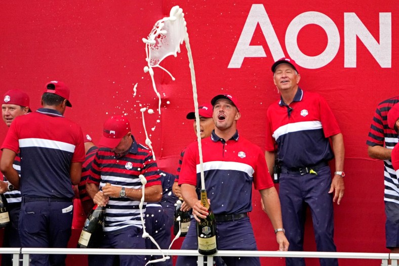 Sep 26, 2021; Haven, Wisconsin, USA; Team USA player Bryson DeChambeau celebrates after the United States beat Europe for the 43rd Ryder Cup golf competition at Whistling Straits. Mandatory Credit: Kyle Terada-USA TODAY Sports