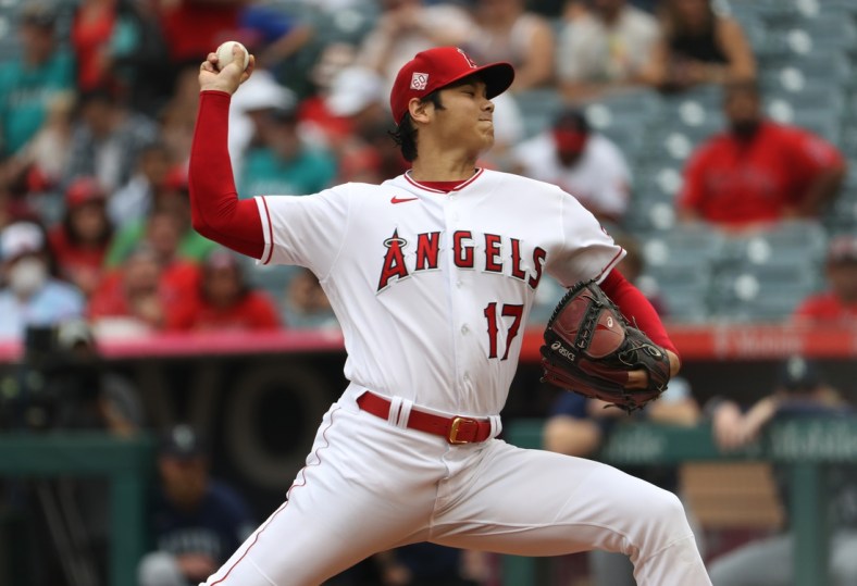 Sep 26, 2021; Anaheim, California, USA; Los Angeles Angels starting pitcher Shohei Ohtani (17) throws a pitch against the Seattle Mariners in the first inning at Angel Stadium. The Mariners won 5-1. Mandatory Credit: Kiyoshi Mio-USA TODAY Sports