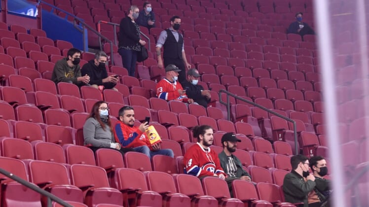 Sep 27, 2021; Montreal, Quebec, CAN; Some of the 7500 fans allowed in look on during the warmup period before a game between the Toronto Maple Leafs and the Montreal Canadiens at the Bell Centre. Mandatory Credit: Eric Bolte-USA TODAY Sports