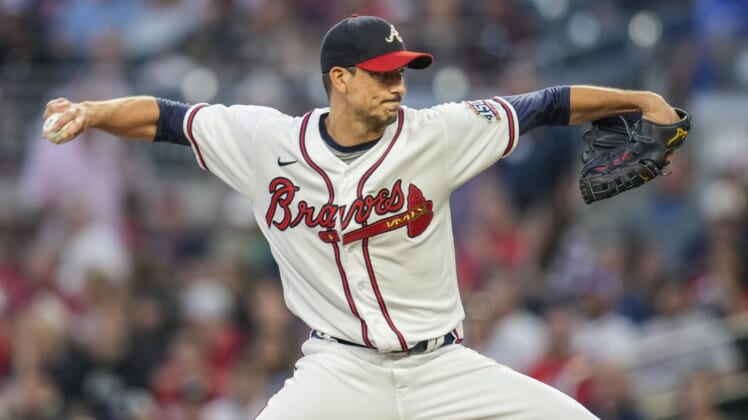 Sep 28, 2021; Cumberland, Georgia, USA; Atlanta Braves starting pitcher Charlie Morton (50) throws against the Philadelphia Phillies during the first inning at Truist Park. Mandatory Credit: Dale Zanine-USA TODAY Sports