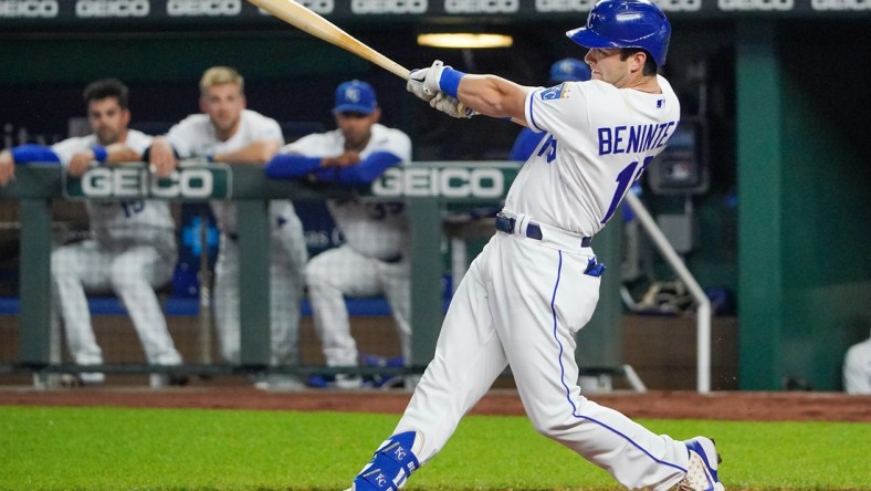 Sep 28, 2021; Kansas City, Missouri, USA; Kansas City Royals left fielder Andrew Benintendi (16) hits a two run home run against the Cleveland Indians in the first inning at Kauffman Stadium. Mandatory Credit: Denny Medley-USA TODAY Sports