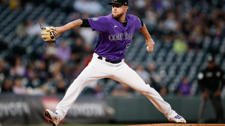 Sep 28, 2021; Denver, Colorado, USA; Colorado Rockies starting pitcher Kyle Freeland (21) pitches in the first inning against the Washington Nationals at Coors Field. Mandatory Credit: Isaiah J. Downing-USA TODAY Sports
