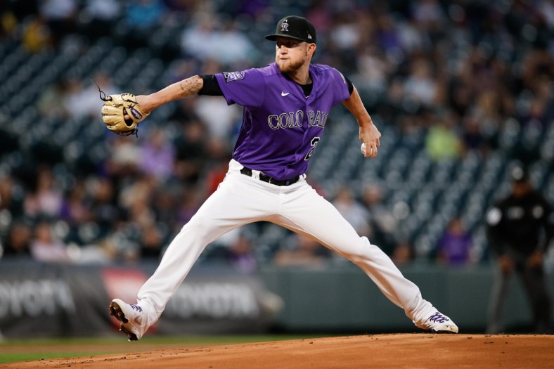 Sep 28, 2021; Denver, Colorado, USA; Colorado Rockies starting pitcher Kyle Freeland (21) pitches in the first inning against the Washington Nationals at Coors Field. Mandatory Credit: Isaiah J. Downing-USA TODAY Sports