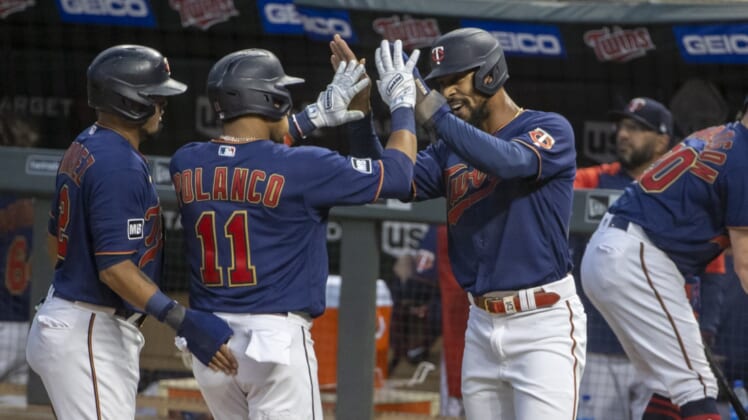 Sep 29, 2021; Minneapolis, Minnesota, USA; Minnesota Twins designated hitter Jorge Polanco (11) celebrates with center fielder Byron Buxton (25) after hitting a three run home run in the first inning against the Detroit Tigers at Target Field. Mandatory Credit: Jesse Johnson-USA TODAY Sports